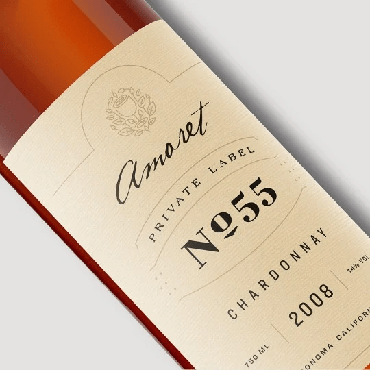 Botella de vino con etiqueta en papel verjurado personalizada