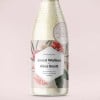 Botella de champán para bodas con etiqueta personalizada con los nombres de los novios