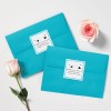 2 sobres azul claro con etiquetas adhesivas cuadradas personalizadas