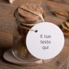 Tarro pequeño con corcho y etiqueta colgante redonda con el texto "tu texto aquí"