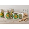 Tarros con pistachos con etiquetas ovaladas personalizadas y rollo de etiquetas