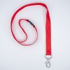 Una correa roja, posiblemente utilizada para perros o como accesorio de identificación.