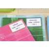 La imagen muestra cuadernos etiquetados con 'Cálculo' y 'Gramática', junto a un bolígrafo y una regla sobre una mesa.